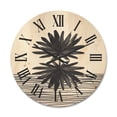 thumbnail image 1 of Designart 'Black and White Striped Under Tropical Leaf II' Modern Wood Wall Clock, 1 of 5
