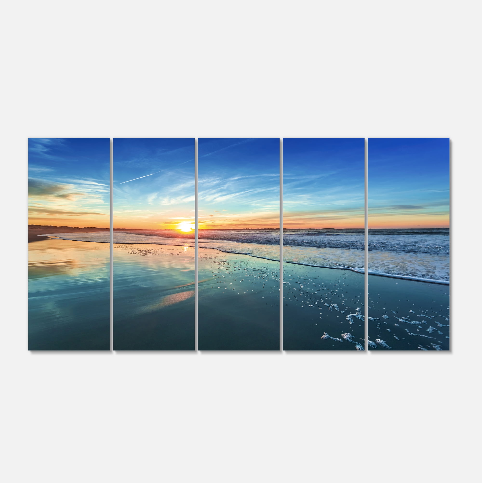 Designart 'Blue Seashore with Distant Sunset ' Seascape Canvas Art Print