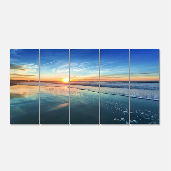 Designart 'Blue Seashore with Distant Sunset ' Seascape Canvas Art Print