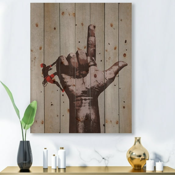 Designart 'Climber With Finger Pointing Up Sign' Modern Print on Natural Pine Wood