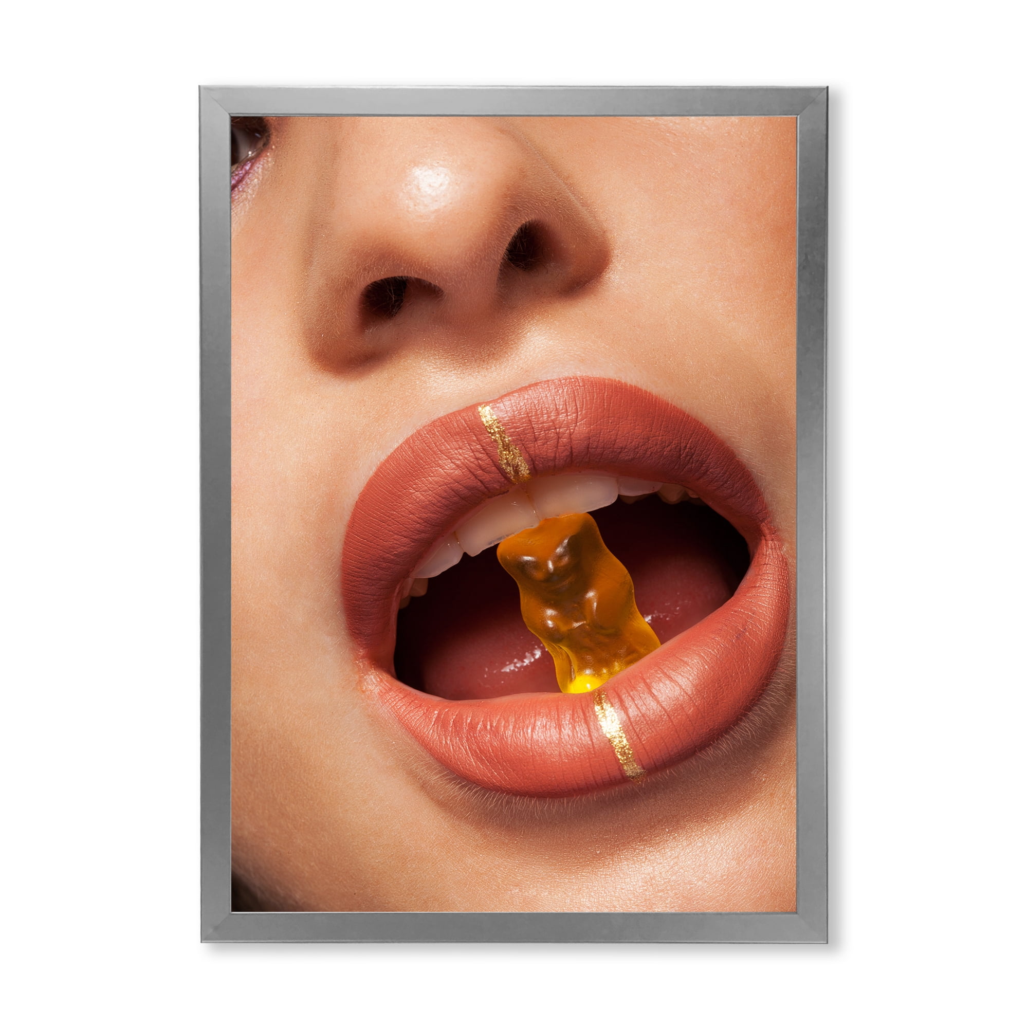 Designart 'Close Up VIew of Female Lips Biting Gummy Bear' Modern Framed Art Print