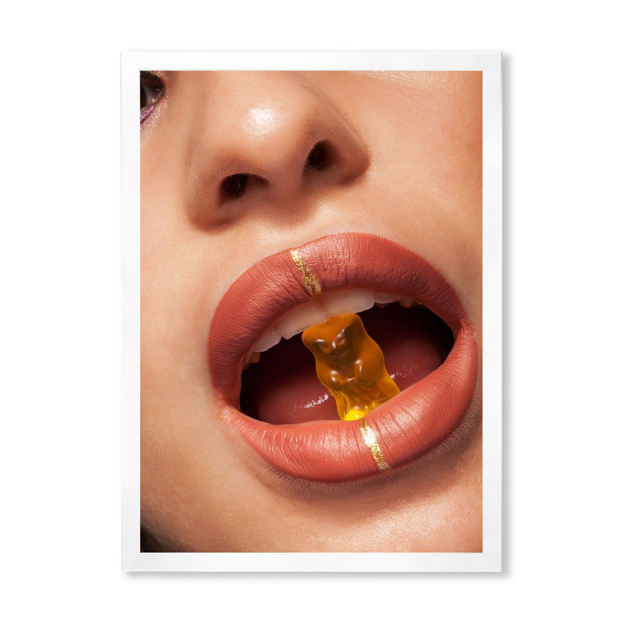 Designart 'Close Up VIew of Female Lips Biting Gummy Bear' Modern Framed Art Print