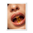 thumbnail image 1 of Designart 'Close Up VIew of Female Lips Biting Gummy Bear' Modern Framed Art Print, 1 of 4