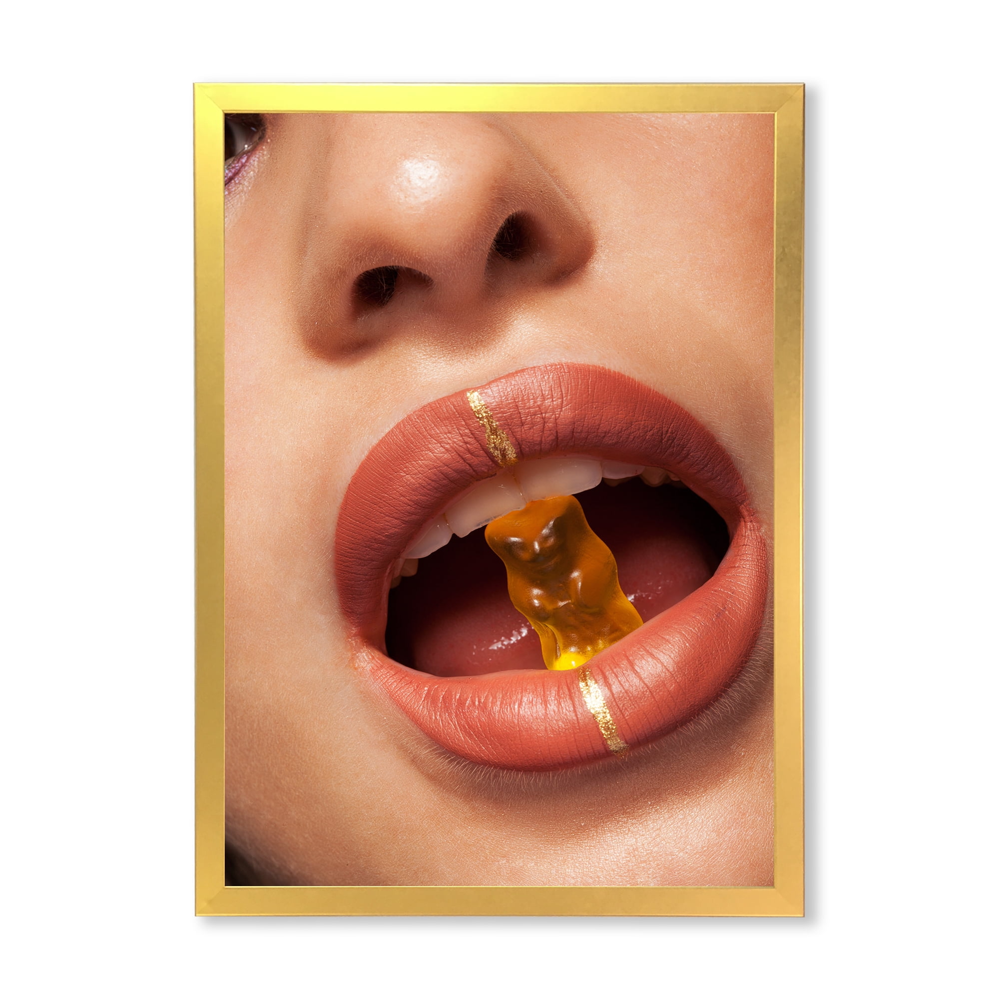 Designart 'Close Up VIew of Female Lips Biting Gummy Bear' Modern Framed Art Print