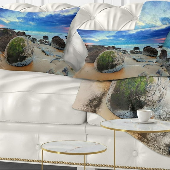 Designart Cloudy Sunrise Over Moeraki Boulders - Seashore Photo Throw Pillow - 12x20
