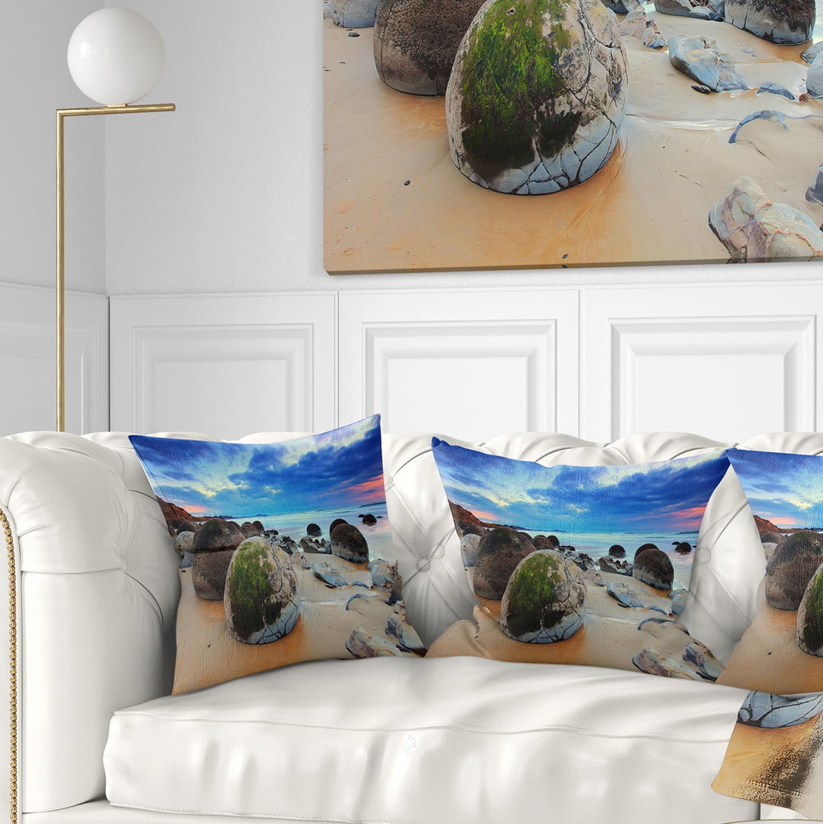 Designart Cloudy Sunrise Over Moeraki Boulders - Seashore Photo Throw Pillow - 18x18