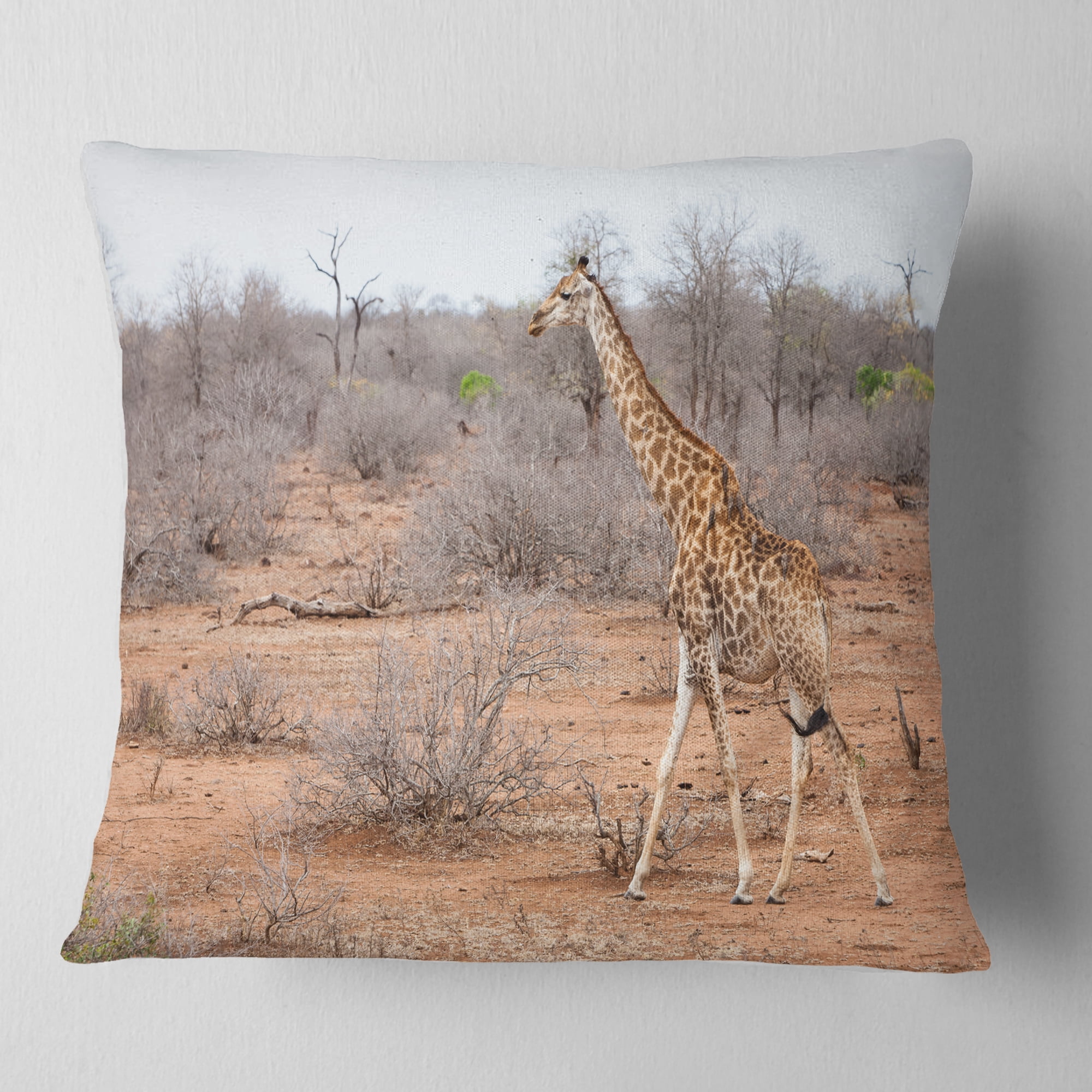 Designart Giraffe Walking through African Forest - Animal Throw Pillow - 16x16