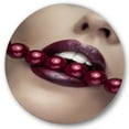 thumbnail image 1 of Designart 'Girl Bitting With Red Lips With Red Pearls' Modern Circle Metal Wall Art 36x36 - Disc of 36, 1 of 5