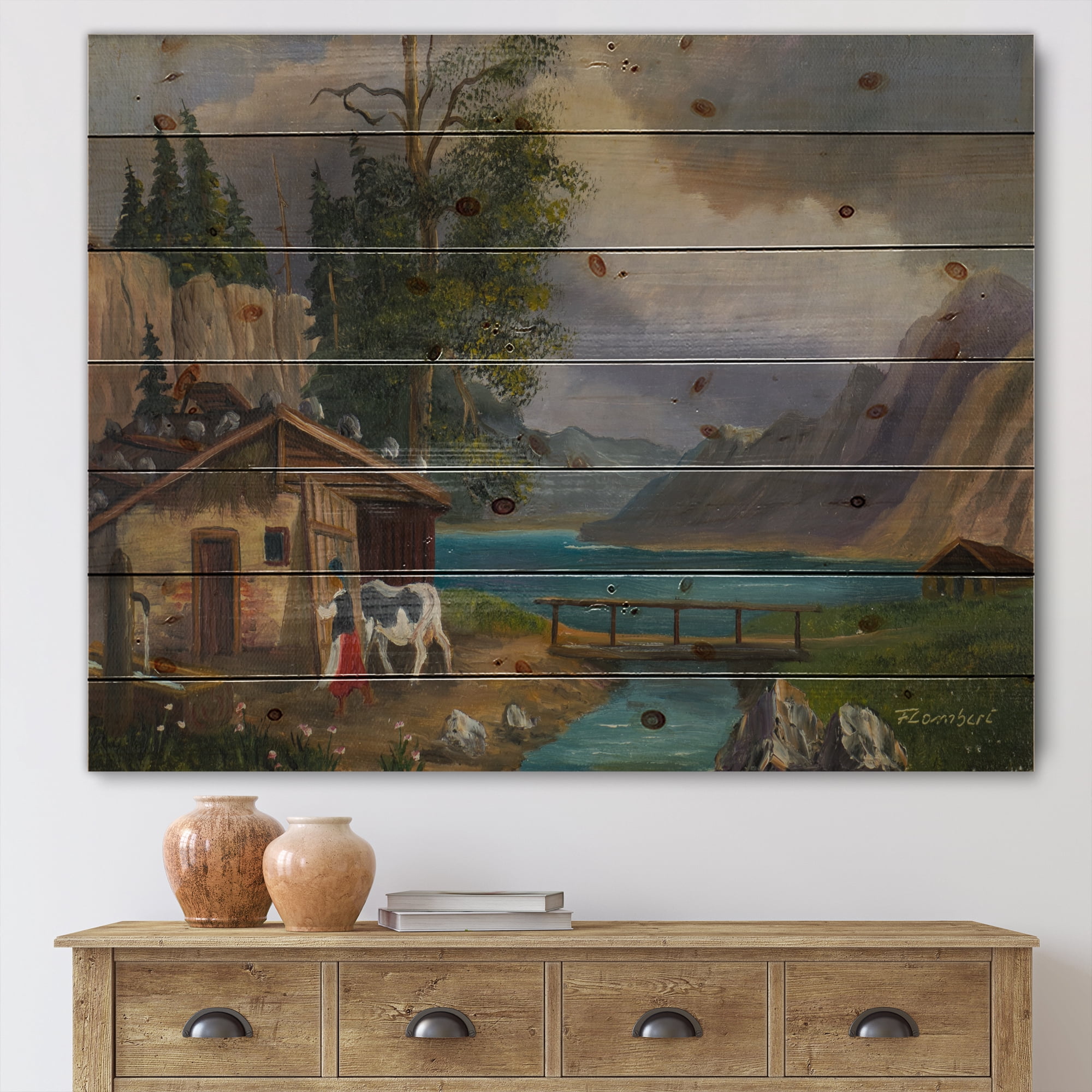 Designart 'Girl Brings The Cow Into The Stable At A Lake' Farmhouse Print on Natural Pine Wood