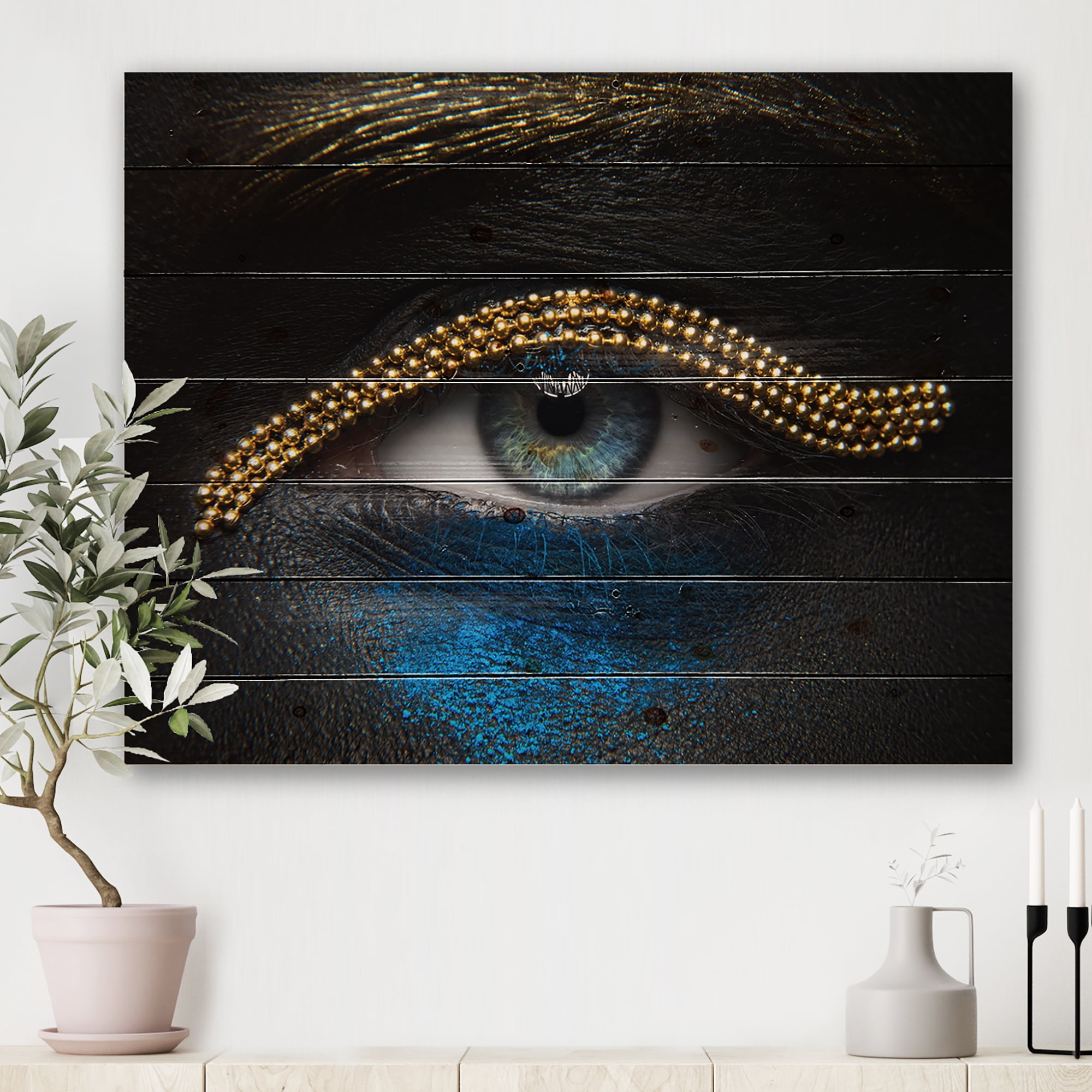 Designart 'Girl Eyes With Gold Chain and Blue Pigment' Modern Print on Natural Pine Wood