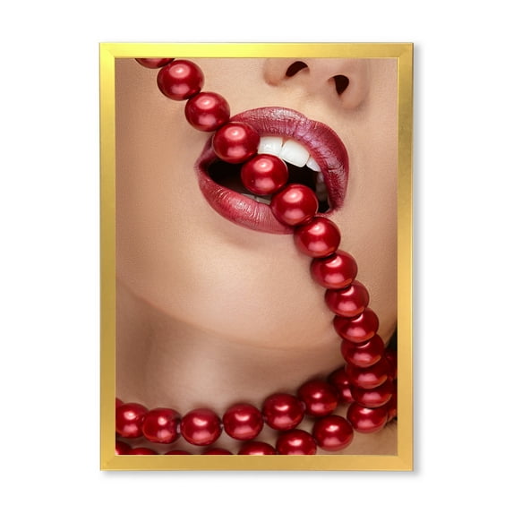 Designart 'Girl Mouth With Red Lipstick Biting Red Pearls' Modern Framed Art Print