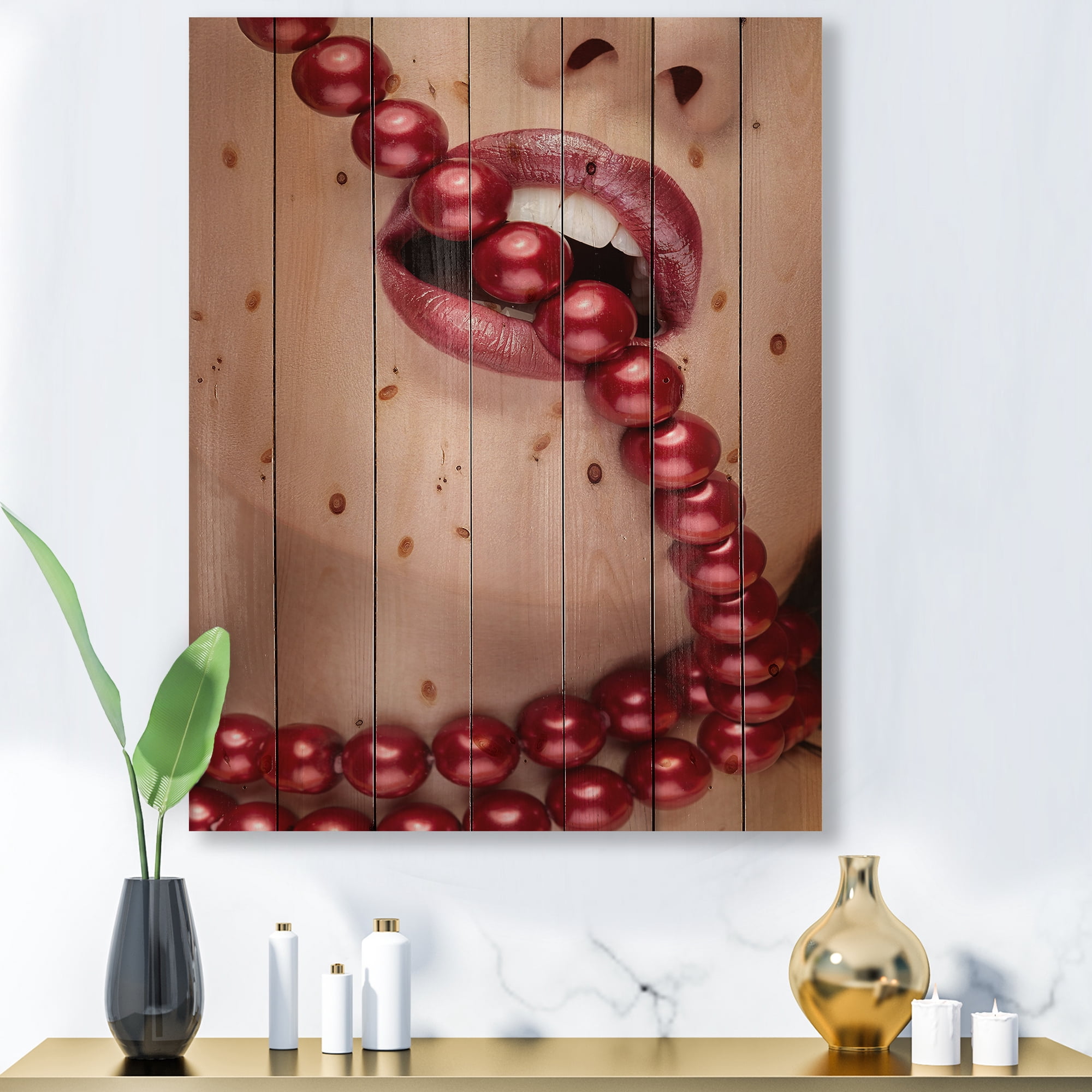 Designart 'Girl Mouth With Red Lipstick Biting Red Pearls' Modern Print on Natural Pine Wood