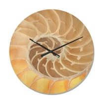 Designart 'Golden Nautilus Seashell Pattern ' Modern Wood Wall Clock