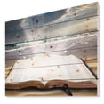 thumbnail image 1 of Designart 'Jesus Bible at beach' Religious Art Print on Natural Pine Wood, 1 of 5