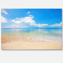 Designart 'Large Clouds Over Calm Beach' Metal Wall Art