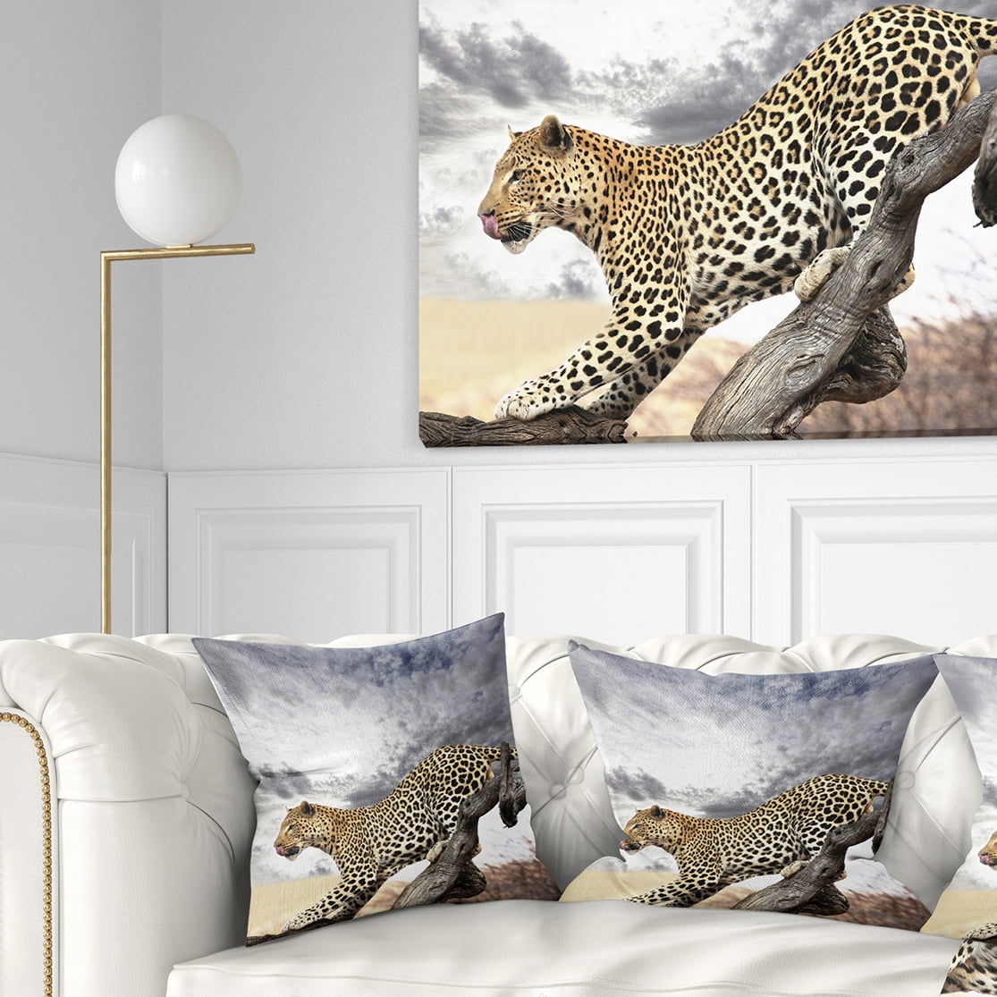 Designart Leopard Taking Rest on Tree Trunks - African Throw Pillow - 16x16