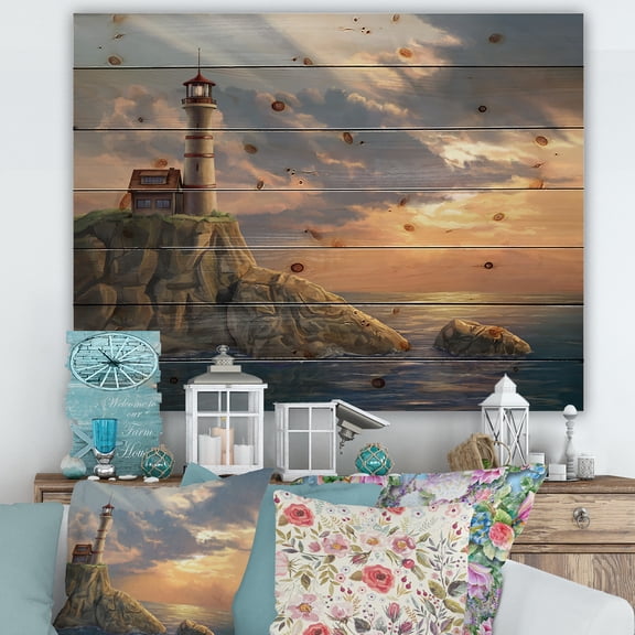 Designart 'Lighthouse On A Rocky Coastal Cliff At Evening Light' Nautical & Coastal Print on Natural Pine Wood