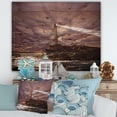 thumbnail image 1 of Designart 'Lighthouse Shining Light During Stormy Clouds Night I' Nautical & Coastal Print on Natural Pine Wood, 1 of 5