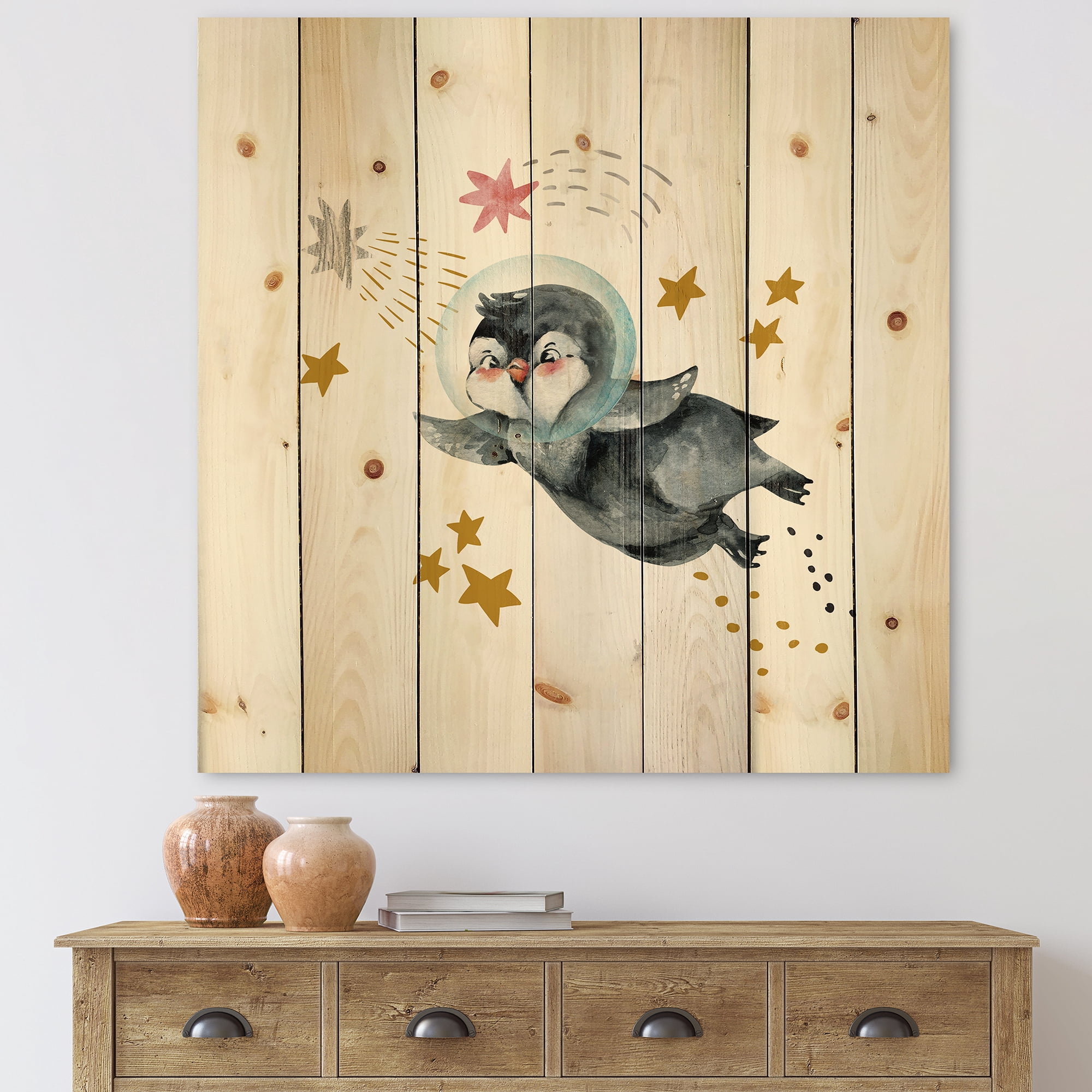 Designart 'Little Penguin Flying Planets and Stars I' Farmhouse Print on Natural Pine Wood