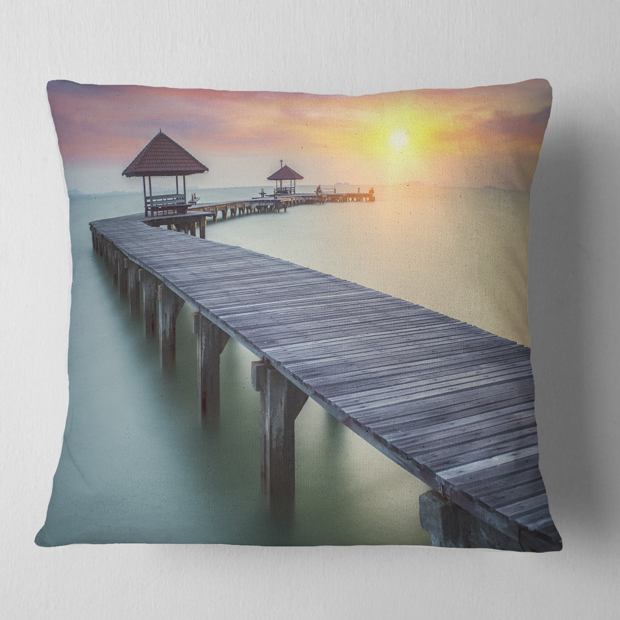 Designart Long Wooden Bridge into the Sunrise - Pier Seascape Throw Pillow - 16x16