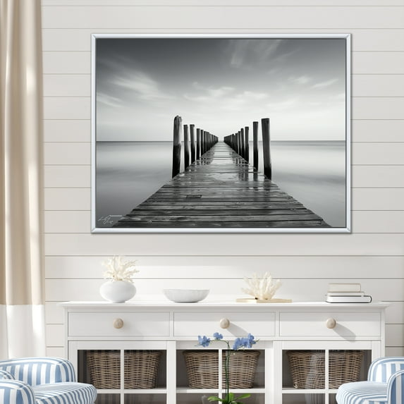 Designart "Monochrome Pier On The Horizon I" Coastal Pier Floater Framed Wall Decor