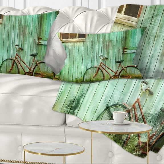 Designart Old Bicycle against Barn - Landscape Photo Throw Pillow - 12x20