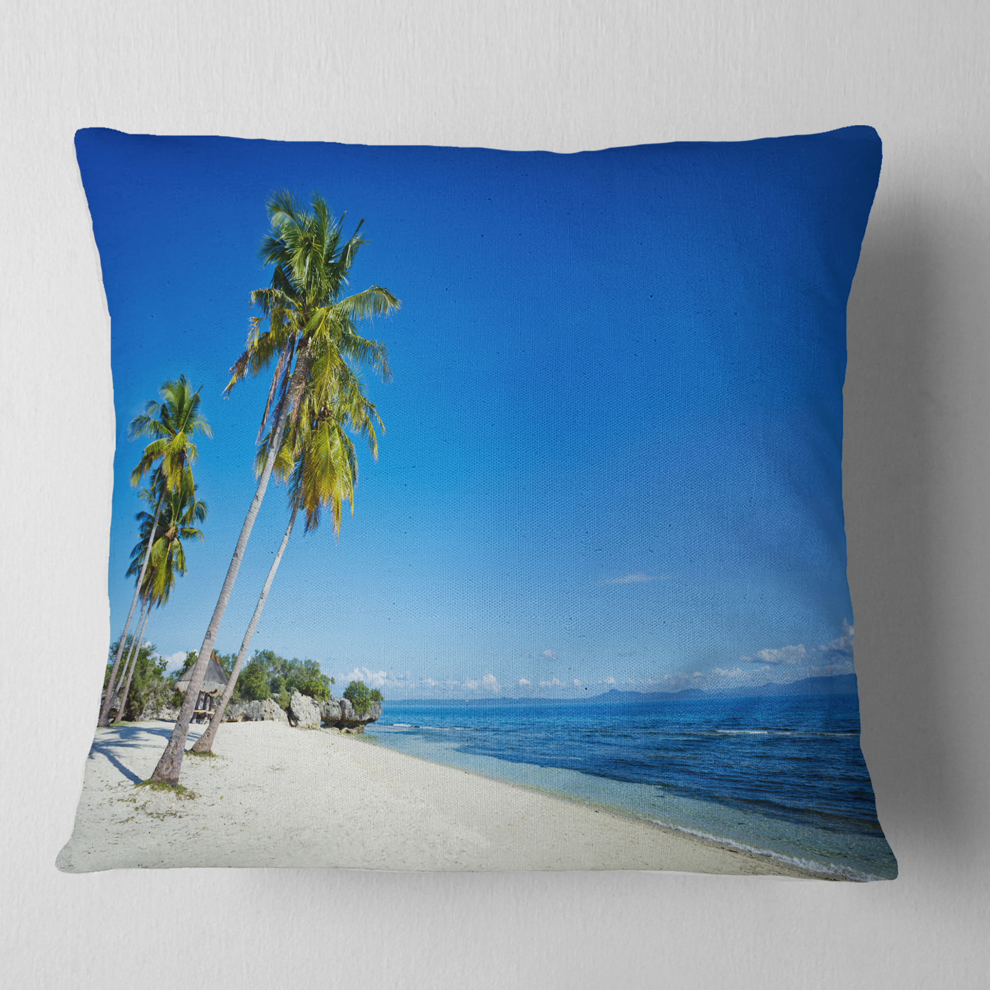 Designart Palms Bent to Beautiful Vacation Beach - Modern Seascape Throw Pillow - 18x18