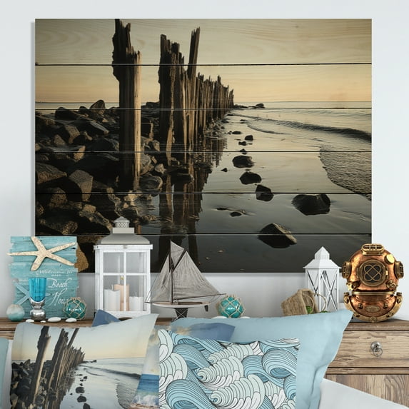 Designart "Pier Reflections Beach Photo V" Nautical & Beach Print on Natural Pine Wood