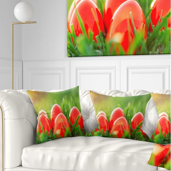 Designart Red Easter Eggs in Green Grass - Landscape Photography Throw Pillow - 16x16