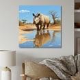 thumbnail image 1 of Designart "Rhinoceros in Africa Majestic Safari Beauty I" Animals Wall Art - Modern Blue Rhinoceros Hallway Wall Art Decor, 1 of 6