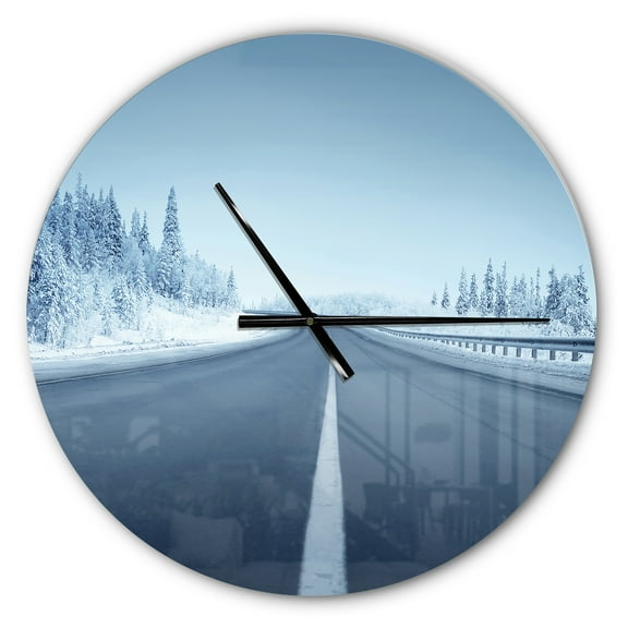 Designart 'Road in winter forest ' Modern wall clock