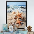 thumbnail image 1 of Designart "Starfish on the Sandy Beach I" Coastal Framed Wall Art - Coastal Yellow Coastal Tropical Entryway Framed Wall Art, 1 of 6