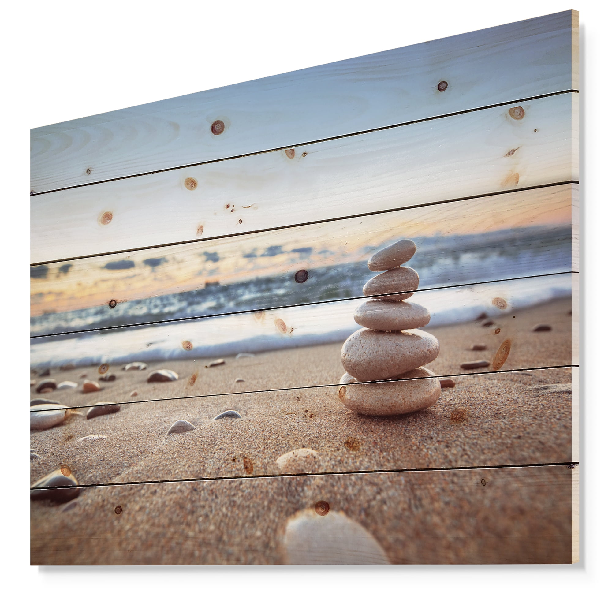 Designart 'Stones Balance on Sandy Beach' Seashore Print on Natural Pine Wood
