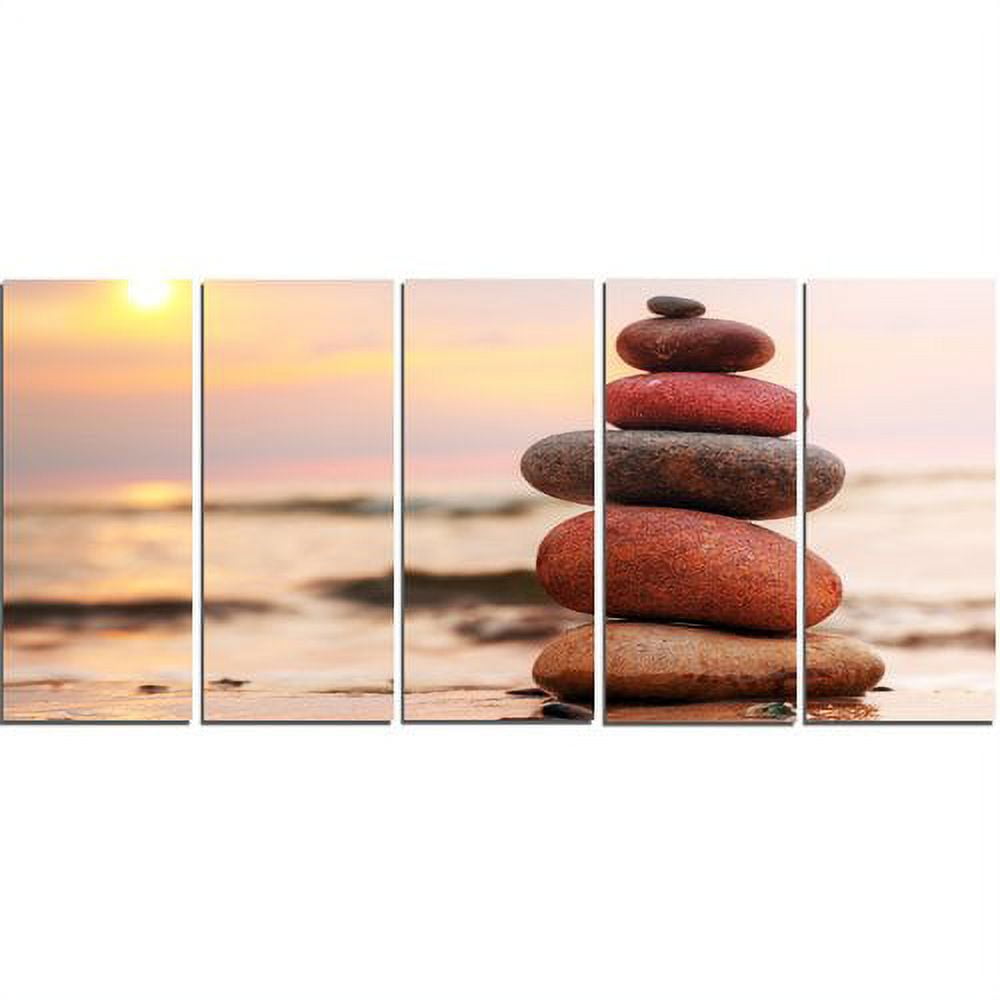 Designart 'Stones Pyramid on Sand Symbolizing Zen ' Landscape Canvas Art Print
