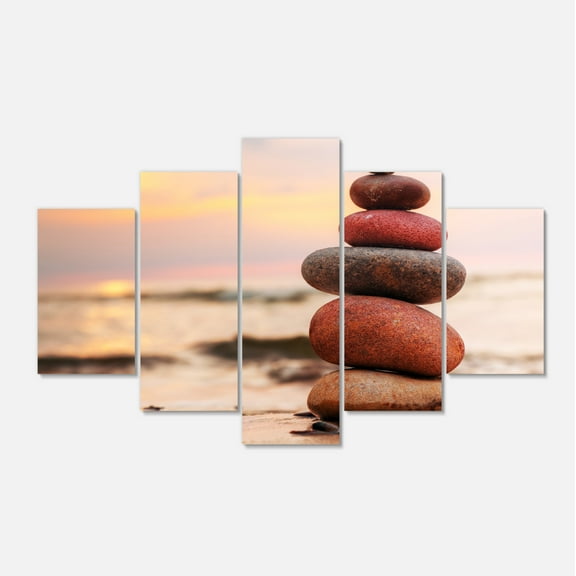 Designart 'Stones Pyramid on Sand Symbolizing Zen ' Landscape Canvas Art Print
