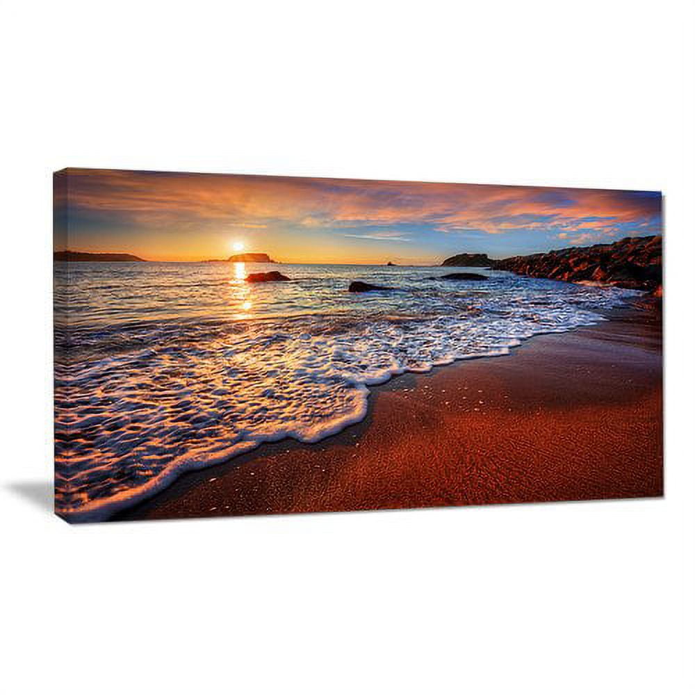 Designart 'Stunning Ocean Beach at Sunset ' Seashore Canvas Art Print