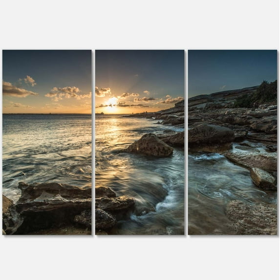 Designart 'Sydney Beach with Bright Sunset ' Seascape Canvas Art Print