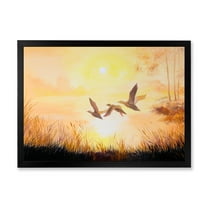 Designart 'Three Cranes Flying Through Warm Sunset' Traditional Framed Art Print