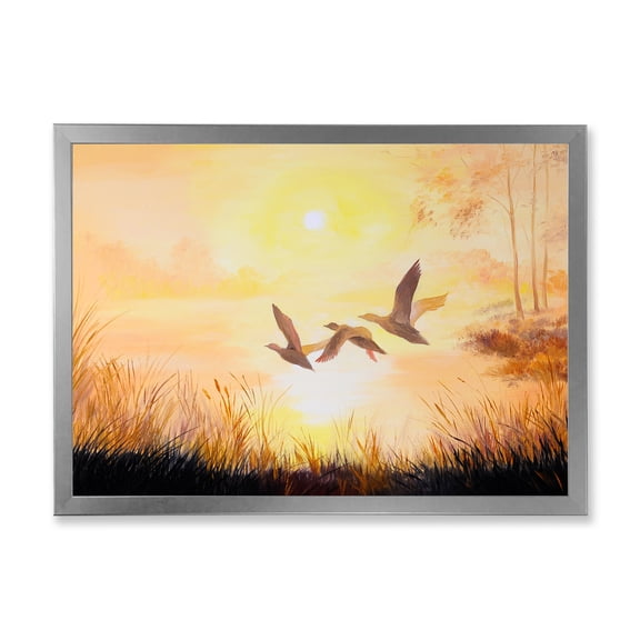 Designart 'Three Cranes Flying Through Warm Sunset' Traditional Framed Art Print