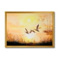 thumbnail image 1 of Designart 'Three Cranes Flying Through Warm Sunset' Traditional Framed Art Print, 1 of 4