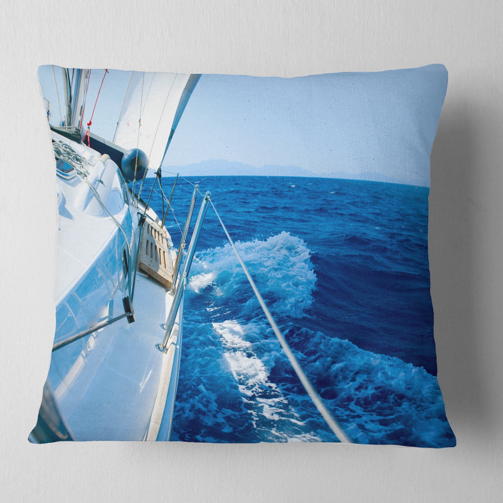 Designart Tourism Yacht Sailing in Blue Sea - Seashore Throw Pillow - 16x16