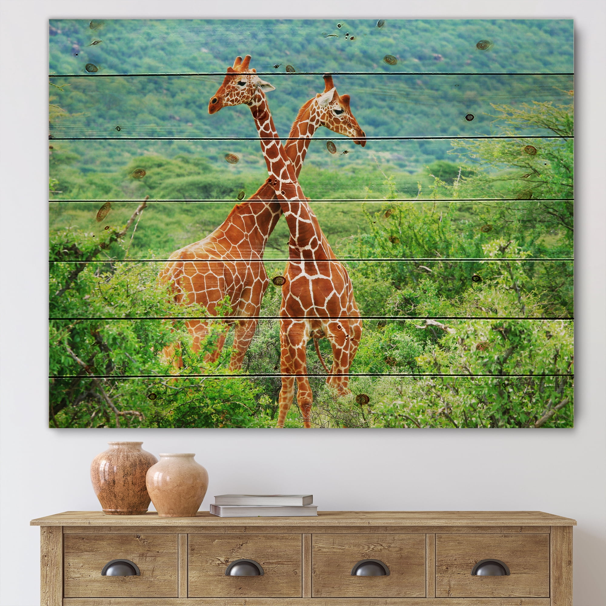 Designart 'Two Giraffes Fighting In Lush Green Wild' Farmhouse Print on Natural Pine Wood
