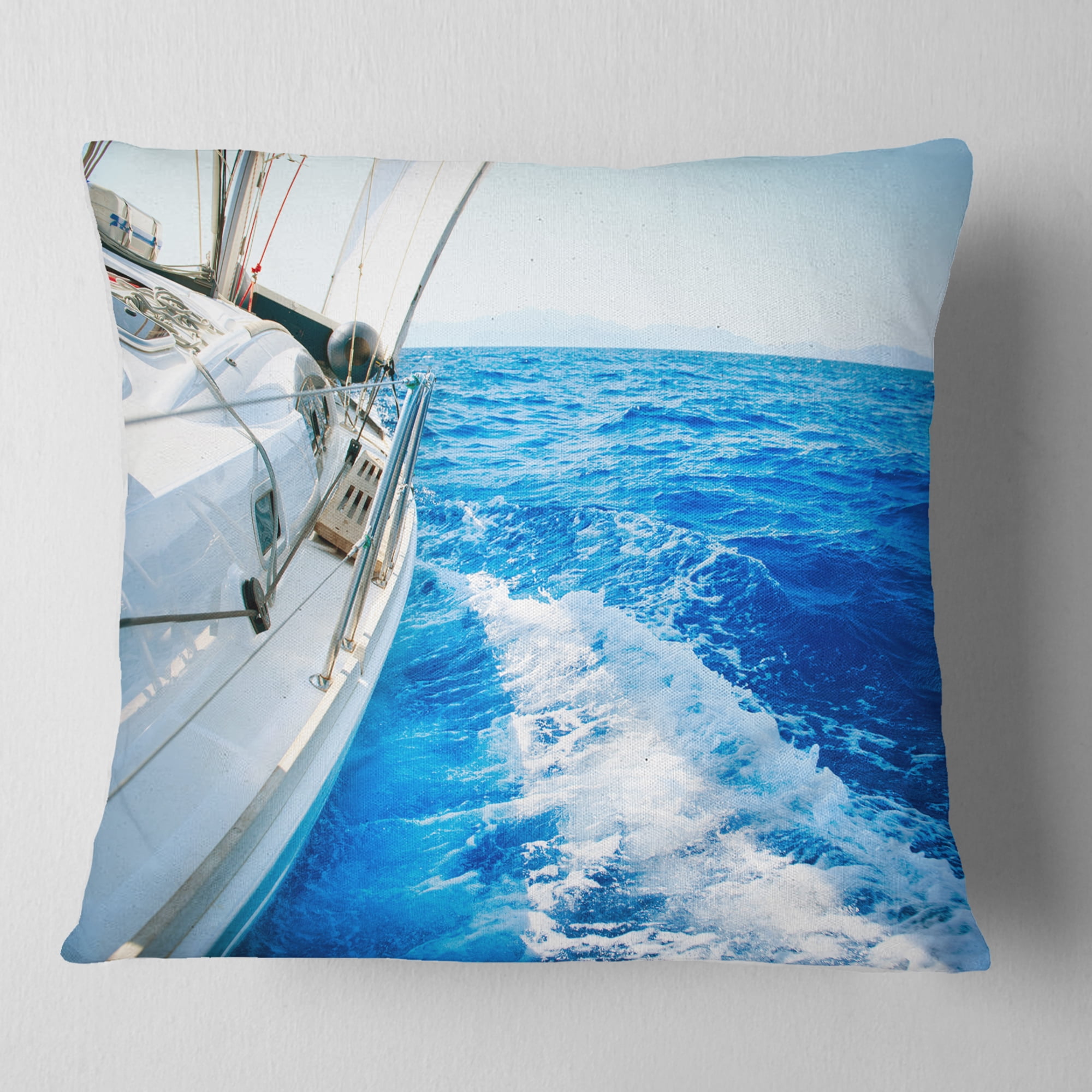 Designart White Sailing Yacht in Blue Sea - Seashore Throw Pillow - 18x18