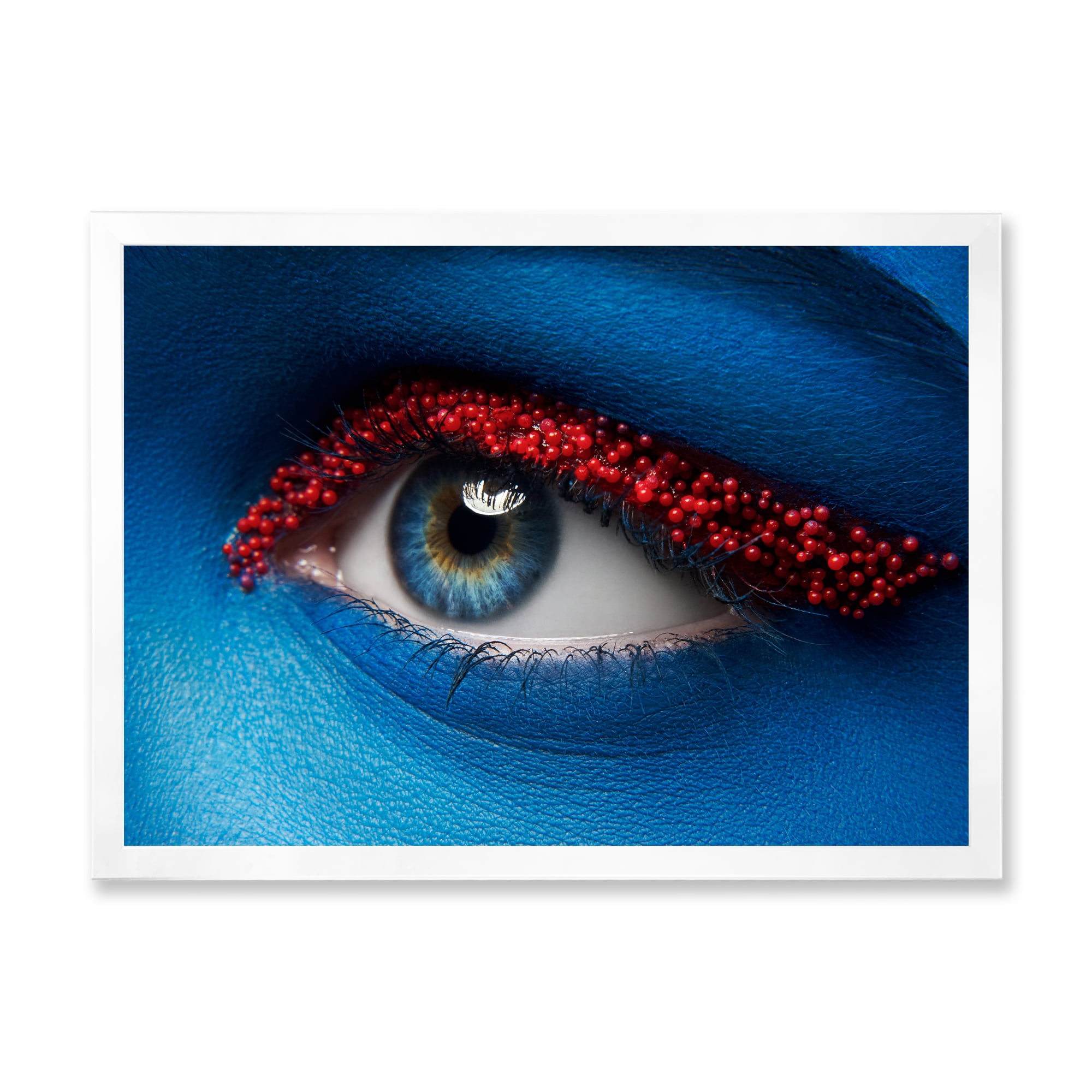 Designart 'Woman Eye With Blue Paint On Face & Red Balls' Modern Framed Art Print