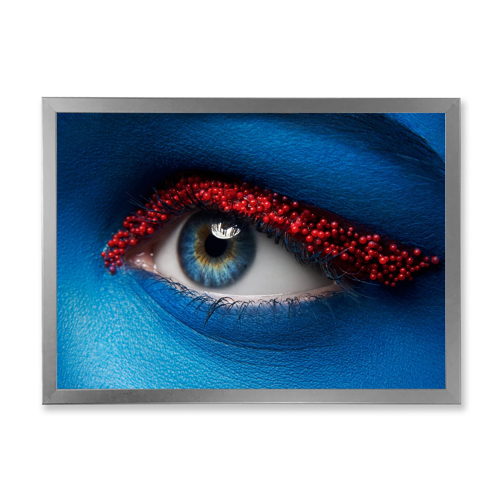 Designart 'Woman Eye With Blue Paint On Face & Red Balls' Modern Framed Art Print