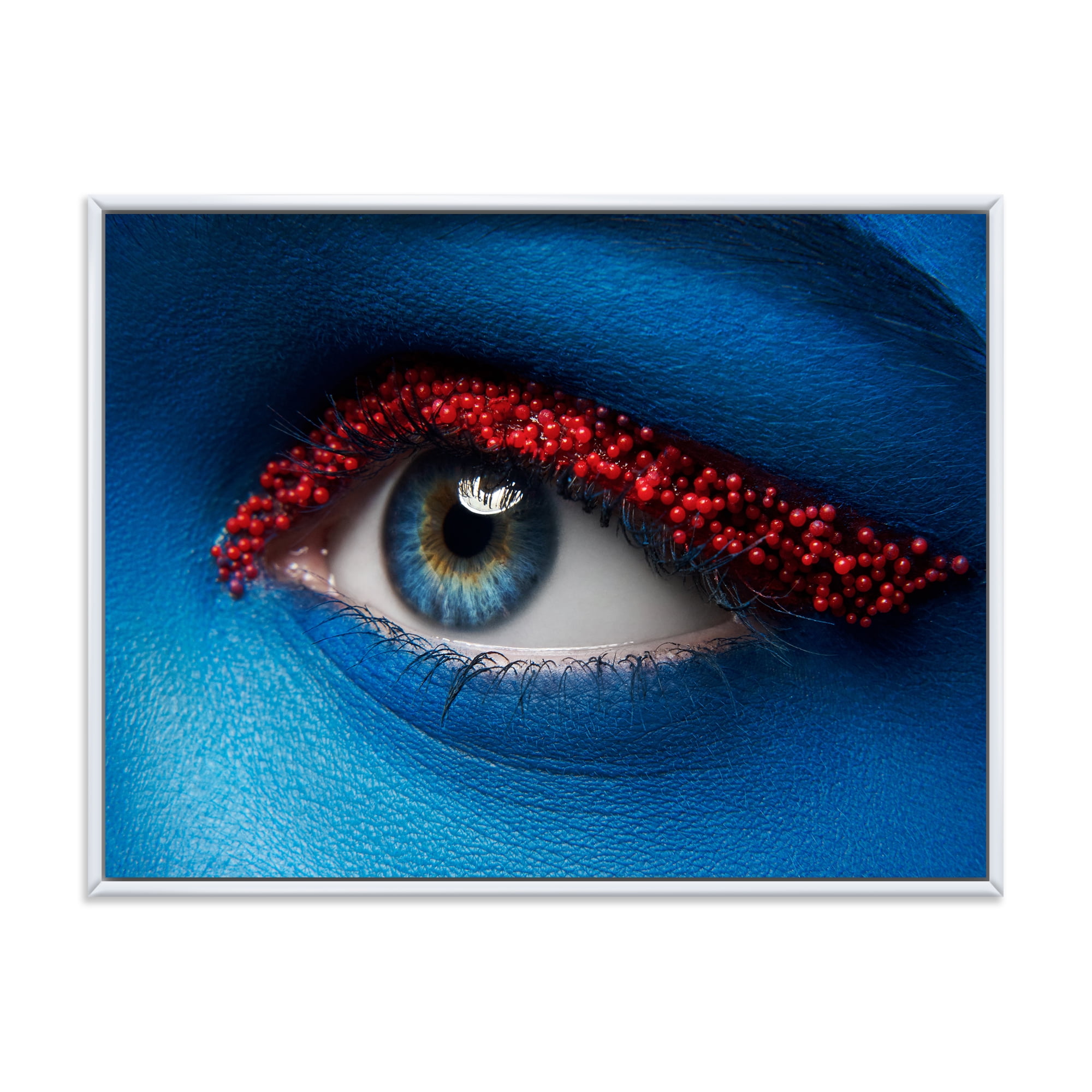 Designart 'Woman Eye With Blue Paint On Face & Red Balls' Modern Framed Canvas Wall Art Print