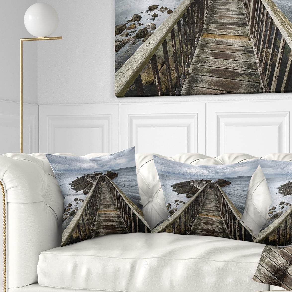 Designart Wooden Pier on North Irish Coastline - Sea Bridge Throw Pillow - 16x16