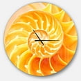 thumbnail image 1 of Designart 'Yellow Nautilus Shell ' Modern Wall Clock, 1 of 4