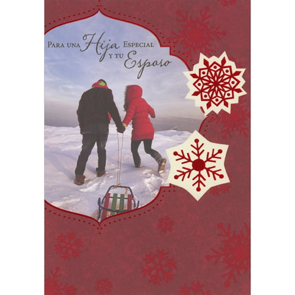 Designer Greetings Winter Weather Couple Pulling Sled on Snowy Hill Spanish Language Christmas Card for Daughter and Husband