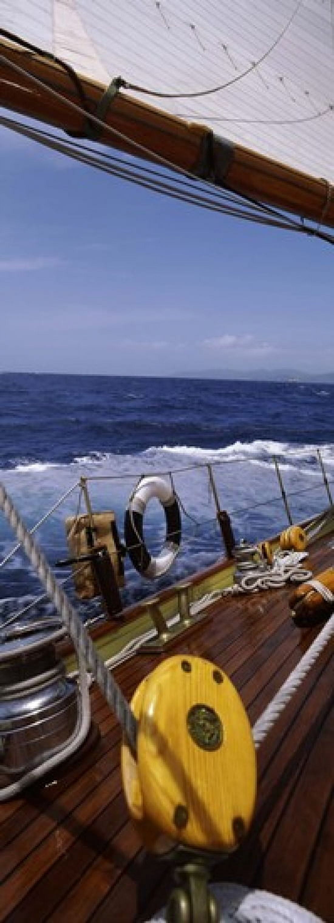 Detail of the mainsheet block of a wooden sailboat in the sea Canvas Art - Panoramic Images (18 x 7)